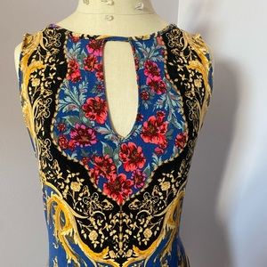 Short-sleeve free people bodysuit.